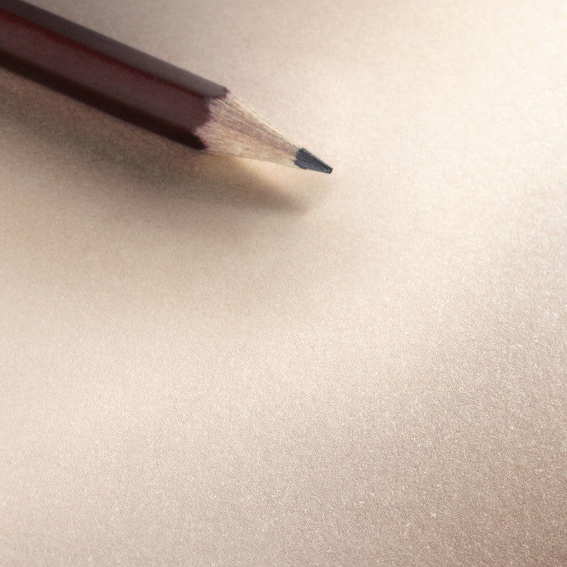 Hahnemühle cappuccino-coloured paper detail with a pencil
